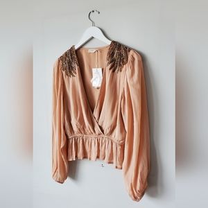 Louizon Airbag nude blouse